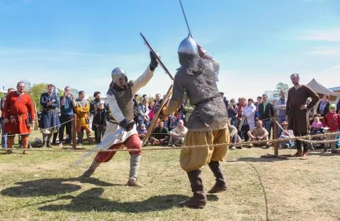 Attack in the battle with swords. 库存照片
