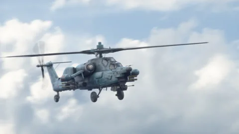 The attack helicopter Mi-28 "Havoc" flies high in the sky. Stock Footage 172537296
