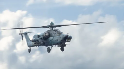 The attack helicopter Mi-28 "Havoc" flies high in the sky. Stock Footage 172583701