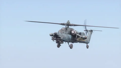 The attack helicopter Mi-28 "Havoc" flies high in the sky. Stock Footage 174298401