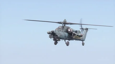 The attack helicopter Mi-28 "Havoc" flies high in the sky. Stock Footage 174827978