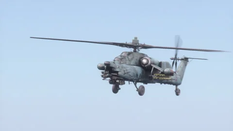 The attack helicopter Mi-28 "Havoc" flies high in the sky. Stock Footage 174837367