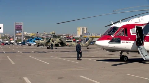 Attack helicopter Mi-28N. Night hunter and helicopter Mi-8 and Mi-38 in parking Stock Footage 106111589