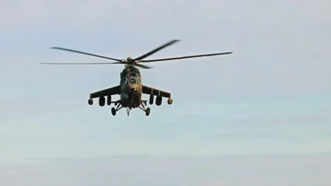 Attack helicopter Mi-35P in flight, view from a parallel helicopter, export 스톡 동영상 173029589