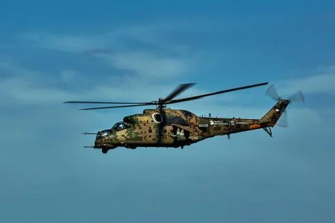 Attack helicopter Mi-35P in flight, view from a parallel helicopter (export v Stock Photos