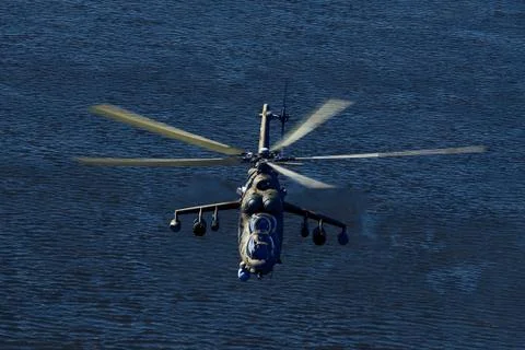Attack helicopter Mi-35P in flight, view from a parallel helicopter (export v Stock Photos