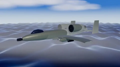 Attack jet on coastal patrol flying low over ocean swell Stock Footage 340874621