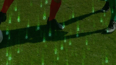 Attacker trapping ball and dribbling while defender tackling and clearing under 스톡 동영상 312758812