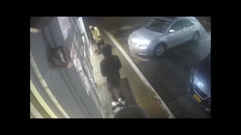 Attempted Robbery Duped by Push Doors - 01 Jan 1970 Stock Footage 205327963