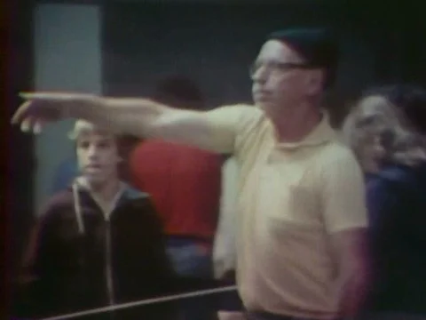 An attendant at the Exploratorium science museum tosses a toy glider and Video stock 75190736