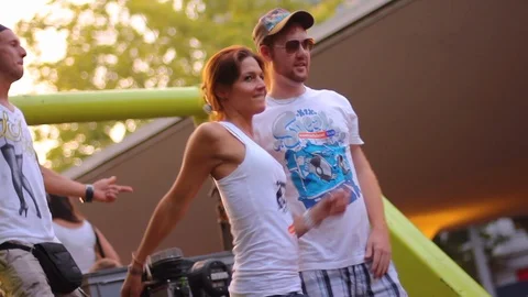 Attendees party chat, dance &amp; drink at Zurich's Love Fest Street Festival Stock Footage 89777391