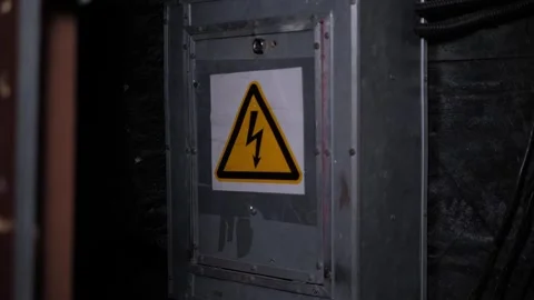 Attention, high voltage warning sign on the switchboard. Stock Footage 311153459
