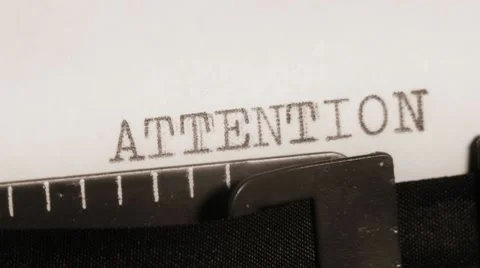 ATTENTION. NOTICE. BRIEFLY. Typing. Stock-Footage 10728709
