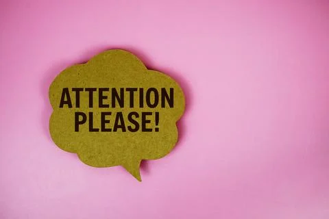 Attention Please! text with speech bubble top view on pink background Stock Photos