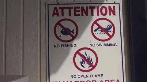 Attention Sign by a lake Stock Footage 41647246