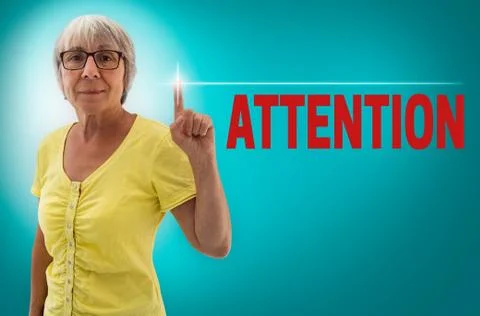Attention touchscreen shown by senior concept Stock Photos