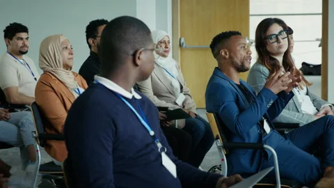 Attentive audience participating in a professional development event Stock Footage 344372459