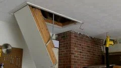 Closing attic ladder door with a stick, Stock Video