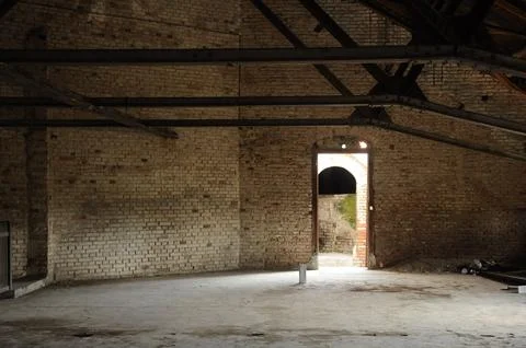 Attic empty room with door. Stock Photos