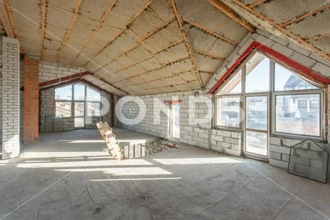 Attic floor of the house. overhaul and reconstruction. Working process of Stock Photos
