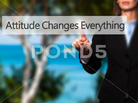 Attitude Changes Everything - Businesswoman hand pressing button Stock Photos