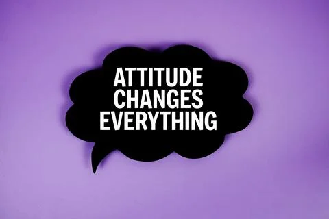 Attitude Changes Everything text with speech bubble top view on purple back.. Stock Photos