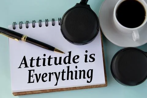 ATTITUDE IS EVERYTHING - words in a white notepad on a light background with  Stock Photos