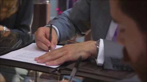 ATTORNEY SIGNING CONTRACT Stock Footage 74433866