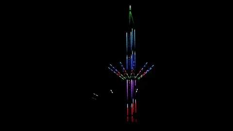 Attraction carousel on long stock, multi-colored with light bulbs in dark time Stock Footage 112420017
