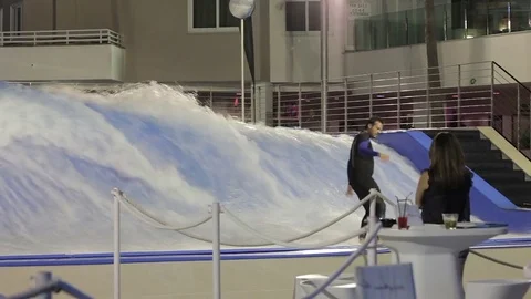 Attraction with riding on the board on the wave. Stock Footage 81048888