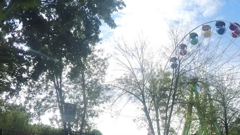 Attractions in the city park on summer day timelapse Stock Footage