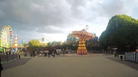 Attractions in park on a summer evening timelapse Stock Footage 78017614
