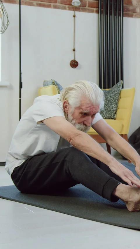 Attractive active calm senior bearded man and woman in white t-shirts and sports Stock Footage 329772417