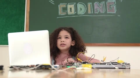 Attractive african student programing system while looking at camera. Pedagogy. Stock Footage 282756670