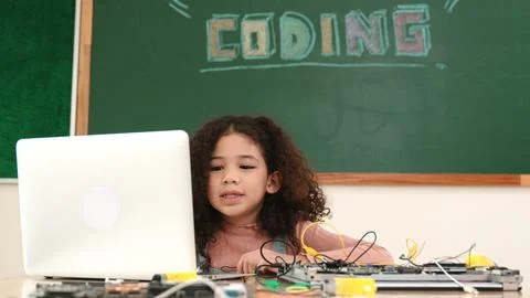 Attractive african student programing system while looking at screen. Pedagogy. Stock-Fotos
