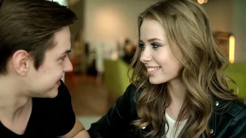Attractive and affectionate young couple relaxing and enjoying. Video stock 69202816
