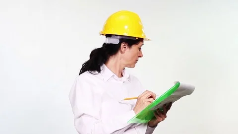 Attractive architect thoroughly examines the construction status Video stock 69855788