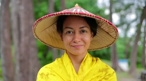 Attractive asian lady with hat Stock Footage 12170248