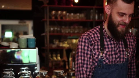 Attractive bartender having break from work at restaurant bar counter drinking Stock Footage 103803810