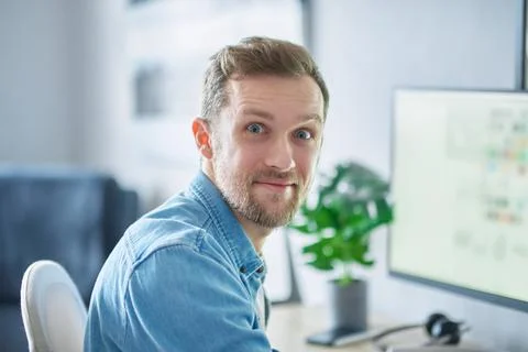 Attractive bearded freelance software developer working from home office Stock Photos