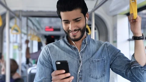 Attractive Bearded Man Standing in the Crowded Tram. Holds the Handrail. Stock Footage 92333085