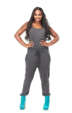 Attractive black female smiling and isolated on white background Stock Photos