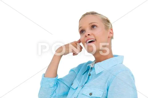 Attractive blonde doing a symbol of phone with her hand and looking up Stock Photos