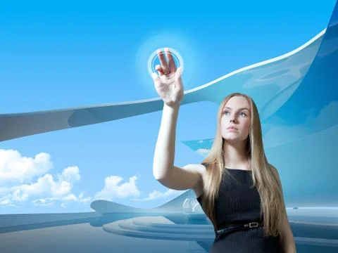 Attractive blonde with interface in futuristic interior Illustrazione stock