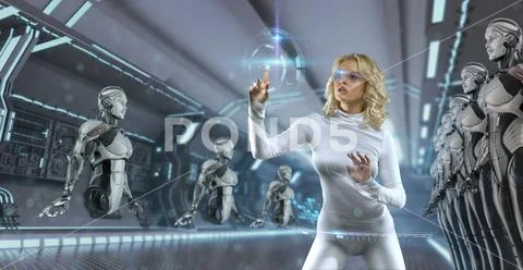 Attractive Blonde model in futuristic environment working with virtual hud in Stock Photos
