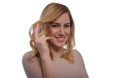 Attractive blonde posing on a white background. Stock Photos