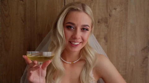 Attractive bride girl looking at camera at living room close up Stock Footage 209130114