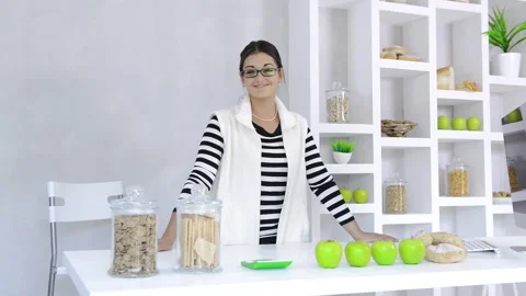 Attractive brunette lab technician working with technology in the study of nutri Vídeo Stock 199629275