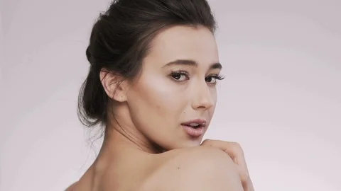 Attractive brunette model at studio background Stock Footage 92521020