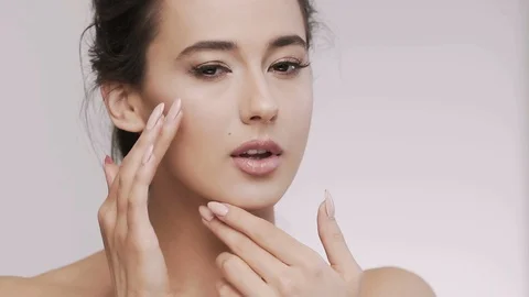 Attractive brunette model at studio background Stock Footage 92522297